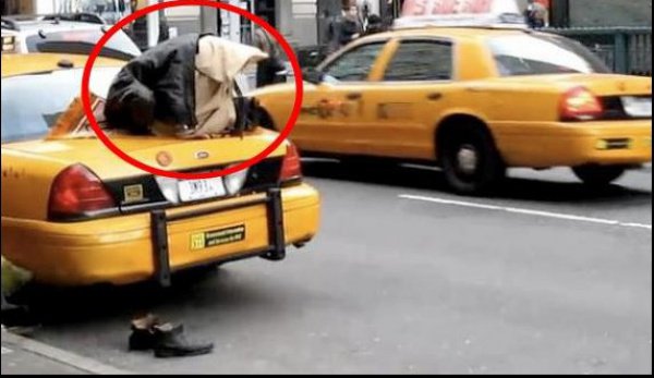 Водитель такси в Нью-Йорке